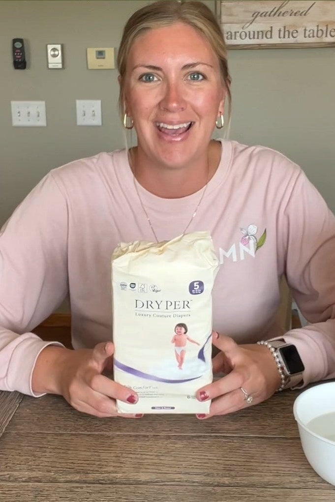 Customer shared photo of a mom and her baby, highlighting parent satisfaction and trust in our Made in USA diaper quality.