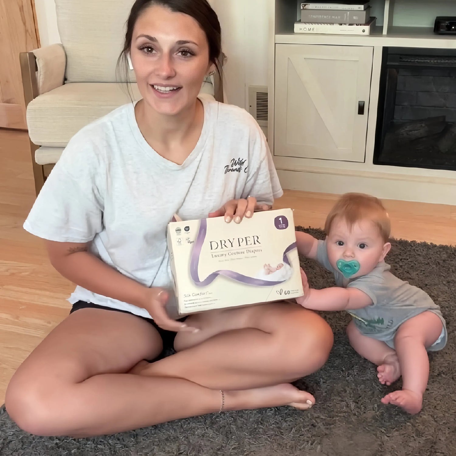 Customer shared photo of a mom and her baby, highlighting parent satisfaction and trust in our Made in USA diaper quality.